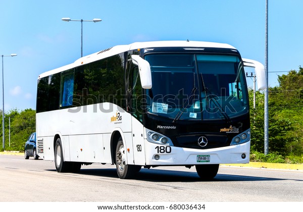 QUINTANA ROO, MEXICO -\
MAY 16, 2017: White touristic coach bus Marcopolo Alliado at the\
interurban road.