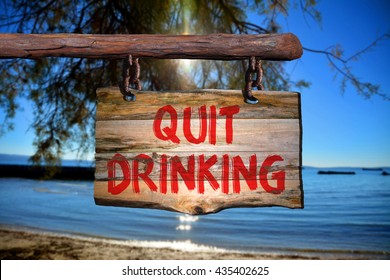 Quit Drinking Motivational Phrase Sign On Old Wood With Blurred Background