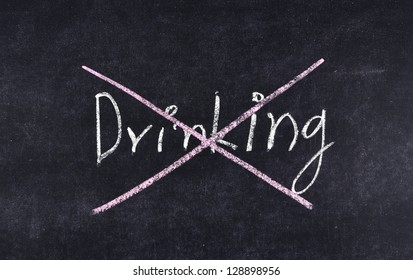 Quit Drinking Written On Blackboard