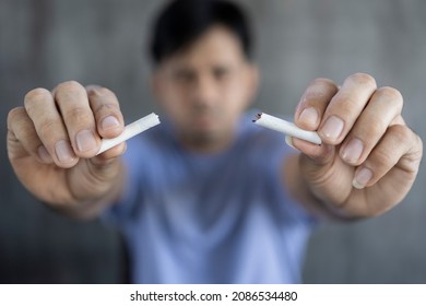 Quit Smoking Concept, Asian Man Breaking A Cigarette Throw Away, No Smoking Campaign Concept