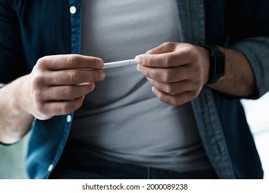 Quit Smoking, Health And Mental Problems, Troubles, Bad Feeling. Stress On Work And Crisis. Sorrowful Millennial Male Holding Cigarette In Hands And Want To Smoke, Cropped, Close Up, Copy Space