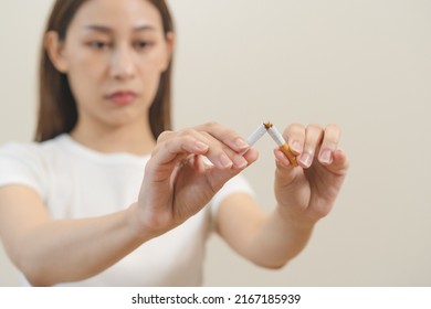 Quit, Stop Smoking, Addiction Asian Young Woman, Girl Refusing Cigarette, Smoker Quitting Smoke, Hand In Broken, Break Tobacco. Quit Bad Habit, Health Care Concept. Willpower Lifestyle Of People.