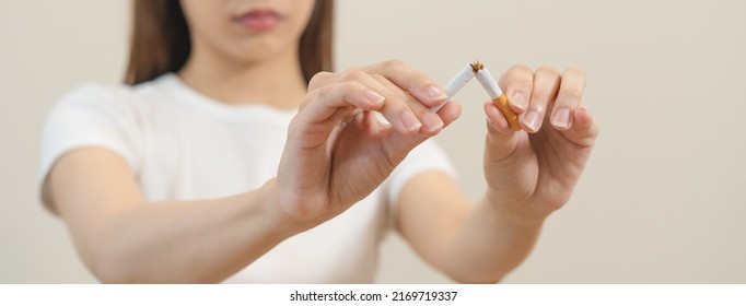 Quit, Stop Smoking, Addiction Asian Young Woman, Girl Refusing Cigarette, Smoker Quitting Smoke, Hand In Broken, Break Tobacco. Quit Bad Habit, Health Care Concept. Willpower Lifestyle Of People.