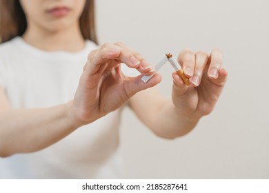 Quit, Stop Smoking, Addiction Asian Young Woman, Girl Refusing Cigarette, Smoker Quitting Smoke, Hand In Broken, Break Tobacco. Quit Bad Habit, Health Care Concept. Willpower Lifestyle Of People.