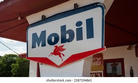 Quitaque, Texas USA - August 1 2022: Vintage Mobil Gas Station And Gas Pumps In Rural West Texas Town, Small Town America