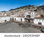 Quito, Ecuador: Aerial the San Francisco church and plaza in the heart of Quito historic colonial city center in Ecuador on a sunny day.