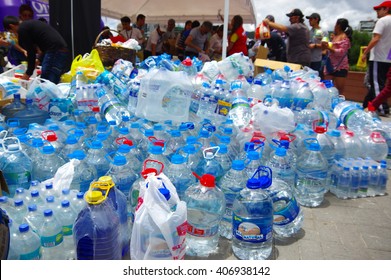 Quito, Ecuador - April,17, 2016: Unidentified Citizens Of Quito Providing Disaster Relief Food, Clothes, Medicine And Water For Earthquake Survivors In The Coast