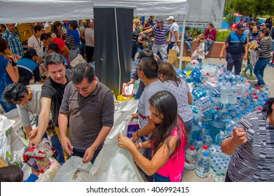 Quito, Ecuador - April,17, 2016: Unidentified Citizens Of Quito Providing Disaster Relief Food, Clothes, Medicine And Water For Earthquake Survivors In The Coast