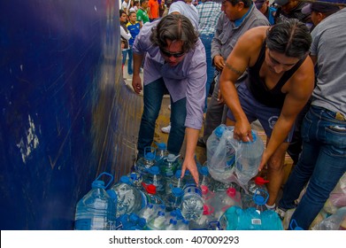 Quito, Ecuador - April,17, 2016: Unidentified Citizens Of Quito Providing Disaster Relief Food, Clothes, Medicine And Water For Earthquake Survivors In The Coast