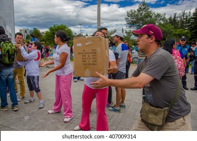 Quito, Ecuador - April,17, 2016: Unidentified Citizens Of Quito Providing Disaster Relief Food, Clothes, Medicine And Water For Earthquake Survivors In The Coast