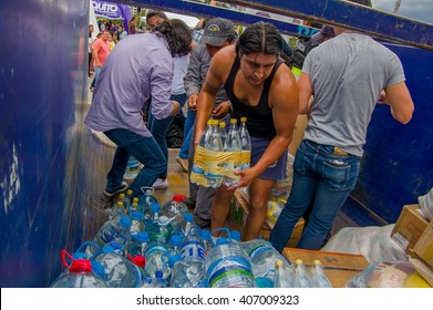 Quito, Ecuador - April,17, 2016: Unidentified Citizens Of Quito Providing Disaster Relief Food, Clothes, Medicine And Water For Earthquake Survivors In The Coast