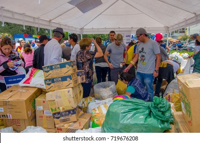 Quito, Ecuador - April,17, 2016: Unidentified People In Quito Providing Disaster Relief Food, Clothes, Medicine And Water For Earthquake Survivors In The Coast