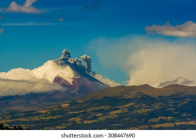 QUITO, ECUADOR - AUGUST 18, 2015: Beautiful Cotopaxi volcano spews ash cloud in Ecuador, South America