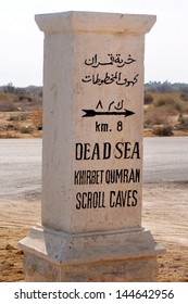 QUMRAN - DEC 14 2008:Stone Signpost directing to Qumran Caves. It was the place where the earliest surviving copies of the Holy Bible where found between 1946 and 1956 .