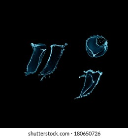 Quotation mark,  comma and dot of water splashes isolated on black background