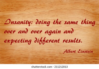 Quote By Albert Einstein On Wooden Background