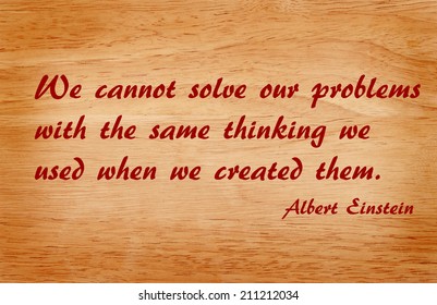 Quote By Albert Einstein On Wooden Background