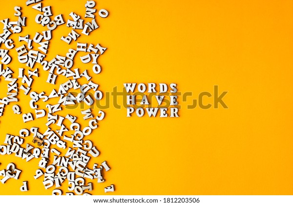 Quote WORDS\
HAVE POWER made out of wooden letters on bright yellow background.\
Motivational Words Quotes\
Concept