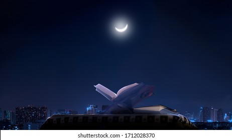  Quran, The Islamic Holy Book, In Dark  City Background