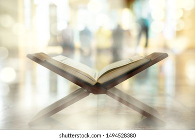 Quran, a muslim holy text book, central religious text of Islam, which Muslims believe to be a revelation from God - Shutterstock ID 1494528380