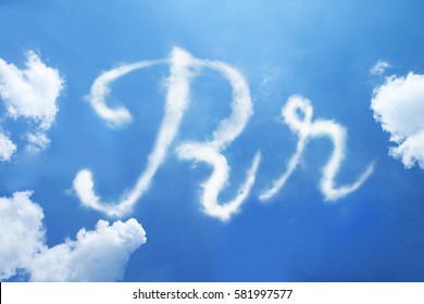 R clouds font calligraphy style ,hand written on sky background. 