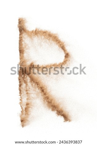 R English alphabet made of Sand explosion with R English alphabet scattered, space for text. Concept of Flying sand particle object to shape in air. White background Isolated throwing element object [[stock_photo]] © 