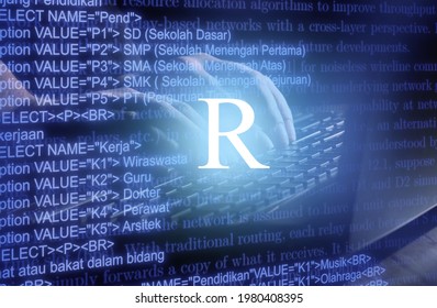 R programming language inscription against laptop computer and code background.