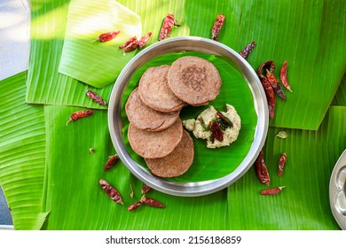 Raagi Dosa Or Millet Dosa, South Indian Famous Breakfast Served In Banana Leaf With Coconut Chutney