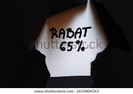 rabat 65 % write on black and white background 