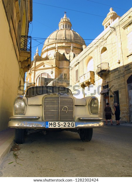 Rabat, Gozo/Malta - 06/21/2013: old model of a\
Mercedes 250 se car of the\
60s