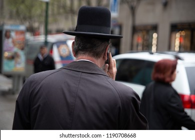 Rabbi Talking On Phone