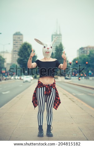 rabbit mask woman in the city