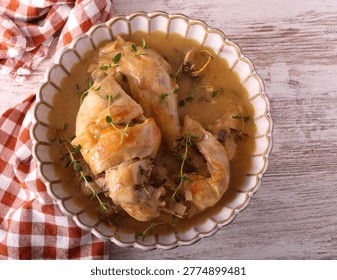 Rabbit with thyme in sauce