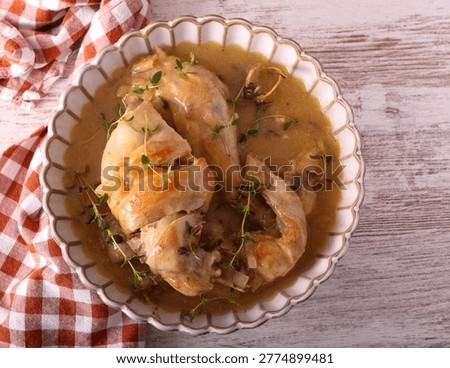 Rabbit with thyme in sauce