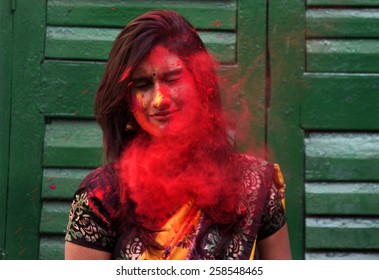 Rabindra Bharati University Student Smearing Color In Basanta Utsav At Jorasanko Thakur Bari On March 02, 2015 In Calcutta, India. 