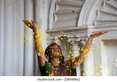 Rabindra Bharati University Student Throwing  Color With Joy In Basanta Utsav At Jorasanko Thakur Bari On March 02, 2015 In Calcutta, India.