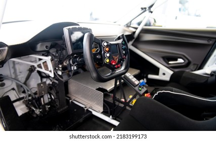 Race Car Driver Seat Cockpit, No People Steering Wheel With Knobs And Cupra Logo. Vallelunga, Italy, July 24 2022, Race Of Italy