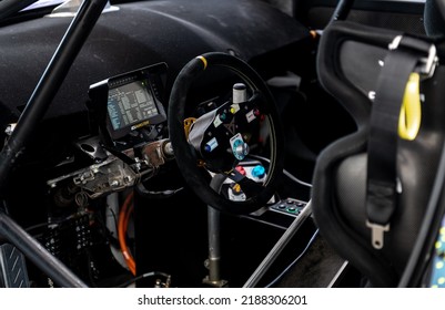 Race Car Driver Seat Cockpit, No People Steering Wheel With Knobs And Cupra Logo. Vallelunga, Italy, July 24 2022, Race Of Italy