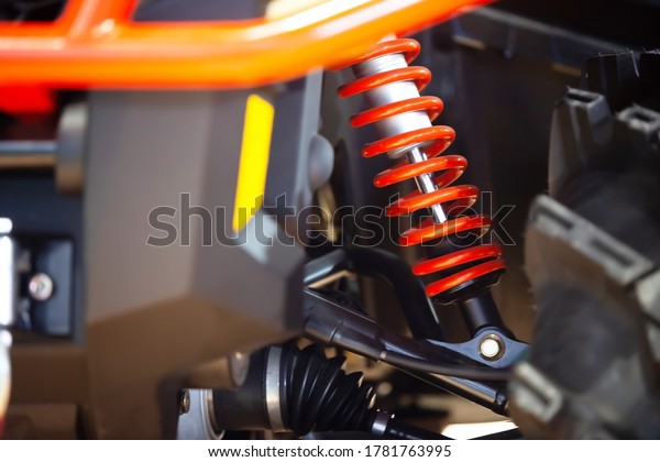 Race car with red shock
absorber