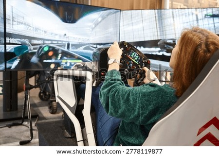 Race driving simulator console player. Virtual driver control and perfomance.