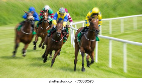 Race horses and jockeys motion blur zoom effect