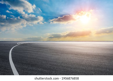 Race Track Road And Sky Clouds At Sunset.Road Ground Background.