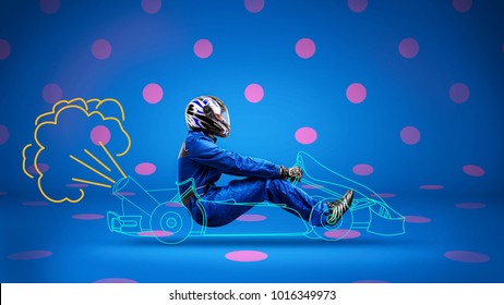 racer in painted racecar on polka-dot background