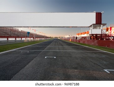 A Racetrack With An Empty Board, For Filling With Text O Logo