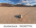 The Racetrack Playa, or The Racetrack, is a scenic dry lake feature with "sailing stones" that inscribe linear "racetrack" imprints.