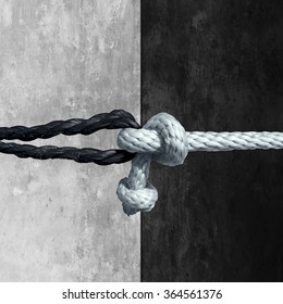 Racial Unity Concept As A Symbol Against Racism In Society As A White And Black Rope Tied Together As A Metaphor For Friendship And Respect.
