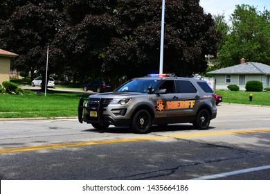 Racine, Wisconsin / USA - June 26, 2019:  Police Vehicle From La Crosse County Sheriff Department Participating In A Fallen Police Officers Funeral Procession. 