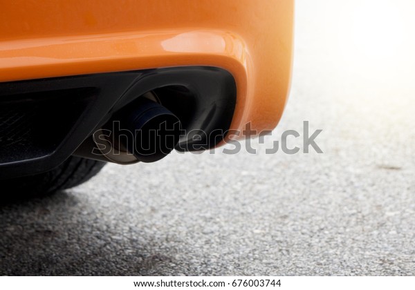 Racing car\
orange color view on backside have\
intake.