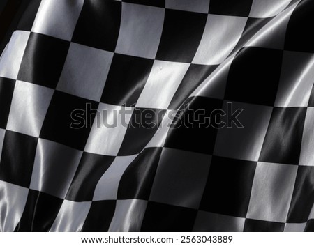 Racing checkered flag as background, closeup view