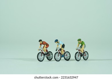 Racing cyclist isolated on light background, side front view - Shutterstock ID 2231632947